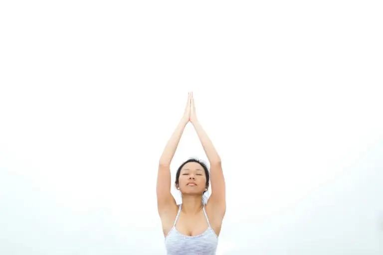 a woman doing a breathing exercise